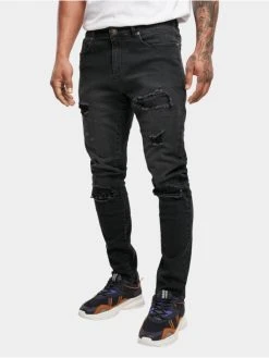 URBAN CLASSICS Herren Slim Fit Jeans Heavy Destroyed In Schwarz